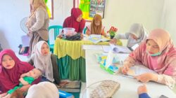 Mahasiswa KKN 146 UMRI Turut Membantu Kegiatan Posyandu di RW 10 Sei Arang